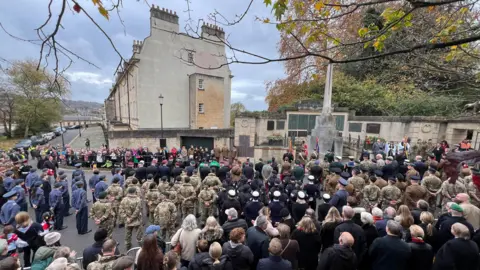 A large crowd of people at a Remembrance Sunday service in Bath.