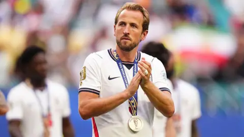 Harry Kane with his World Cup bronze medal