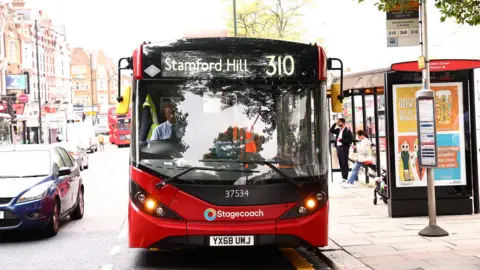 Transport for London The 310 bus at a bus stop