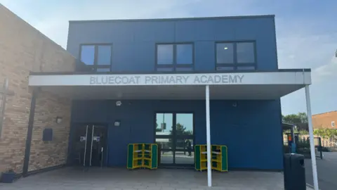 Archway Learning Trust The entrance of Bluecoat Primary School in Nottingham.