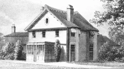 The image shows a black and white image of a house surrounding by greenery. 