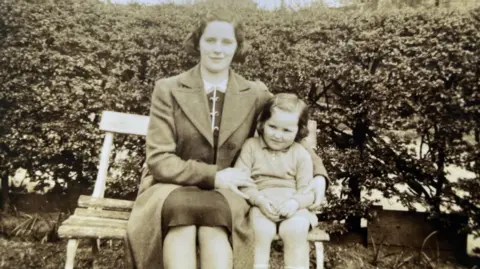 Supplied A black-and-white photo of two evacuees
