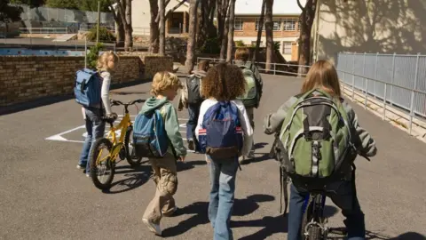 Getty Images Children walking and cycling to school (generic)