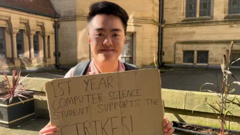 BBC/Vanessa Clarke Student Julian on the picket