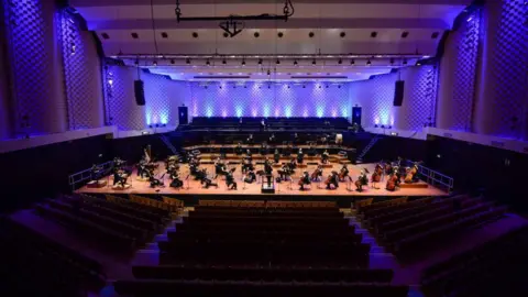 Getty Images Bournemouth Symphony Orchestra on stage at the Lighthouse Poole, rehearsing in an empty theatre