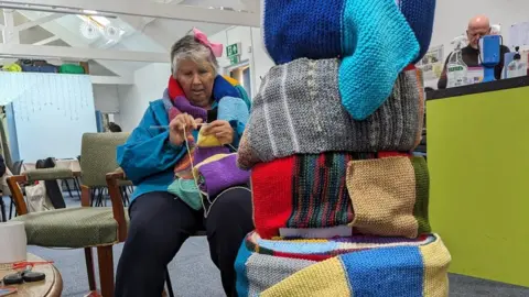 Bridport Community Kitchen Knitting the giant scarf