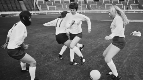 Getty Images An England Women's football team training session at Wembley Stadium in London, England, 15th November 1972