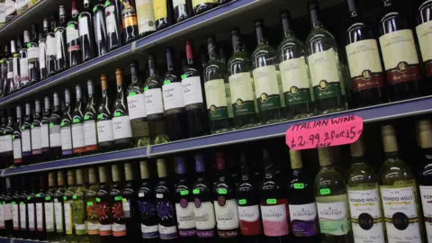 Getty Images Bottled drinks on a shelf