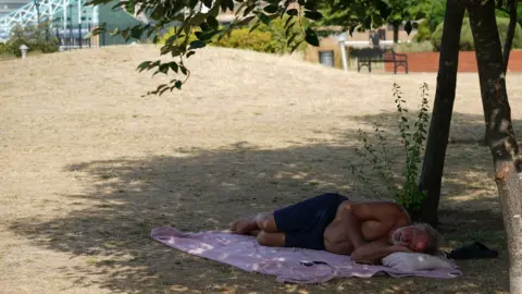 PA Media The UK is not adapted to the high temperatures seen last week, experts say