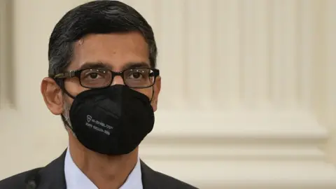 Getty Images Google chief executive Sundar Pichai wearing a face mask