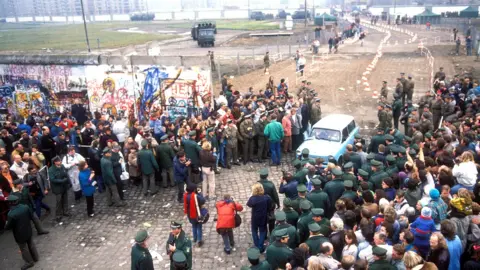 Getty Images The fall of the Berlin Wall - border crossing at Potsdamer Platz - November 1989