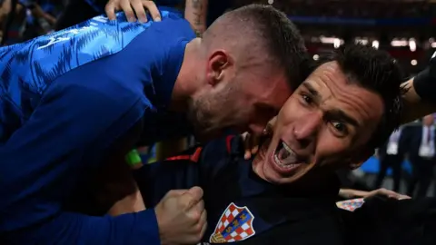 AFP/Getty Images Mandzukic celebrates