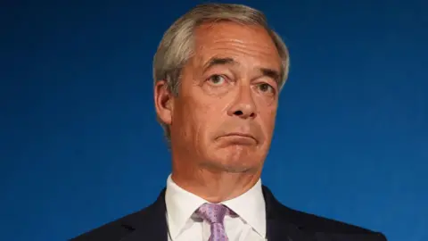 PA Media Reform UK party leader Nigel Farage speaking during a press conference in Westminster, central London.