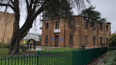 PA Media A side view of Pollokshaws Parish Church following a fire.