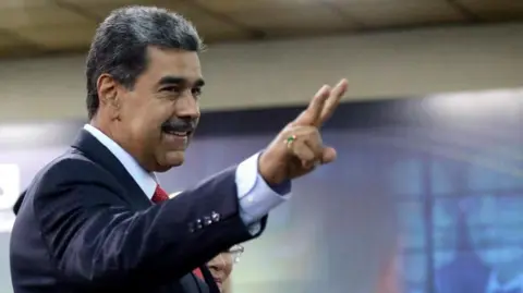 EPA The President of Venezuela, Nicolas Maduro, gestures as he leaves the Supreme Court of Justice (TSJ) in Caracas, Venezuela, 31 July 2024.