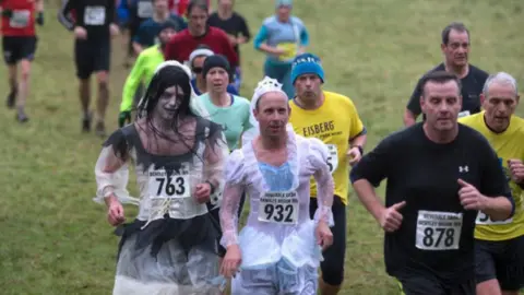 Dovedale Dash Runners in fancy dress in the Dovedale Dash in Derbyshire