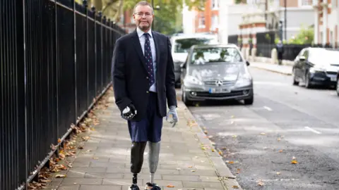 PA Media Former Conservative MP Craig Mackinlay - besides  known arsenic  Lord Mackinlay of Richborough - pictured successful  Pimlico, cardinal  London.