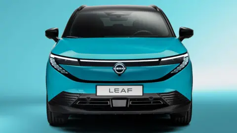 The third-generation model of the Nissan LEAF electric car. It is blue and black with the Nissan logo on the front.