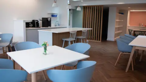 CLIVE DUNKEY Day service area at the hospice