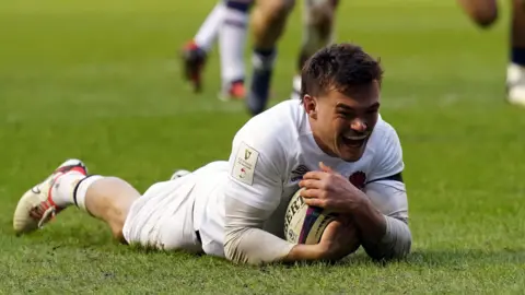 PA Media George Furbank scores a try for England