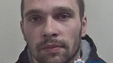 Kent Police Close up police custody image of Adrian Badea 