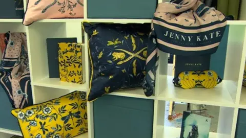 Some of the Jenny Kate's cushions and notepads