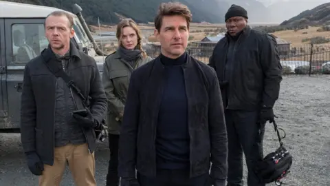 Paramount From left to right: Simon Pegg, Rebecca Ferguson, Tom Cruise and Ving Rhames