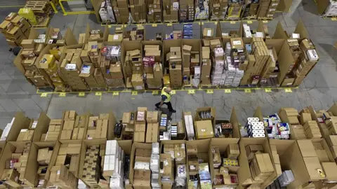 Getty Images Amazon packages at a fulfilment centre