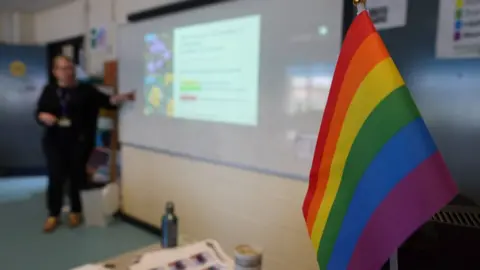 BBC/Gemma Laister Pride flag on school desk