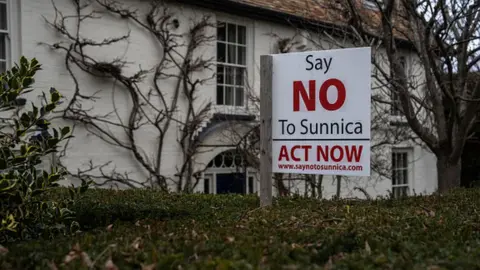 Getty Images A sign which says "Say no to Sunnica"