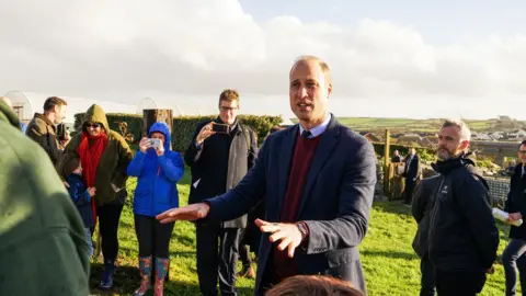 Reuters Prince William speaking to a children and adults at Newquay Orchard