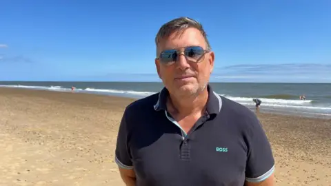 Tracy Moore Matt Moore on Southwold beach where he was stung by a weever fish
