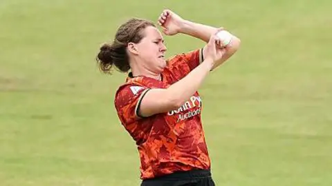 The Blaze player Kathryn Bryce bowling
