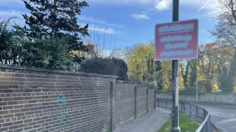 Terry Blackburn Defaced sign