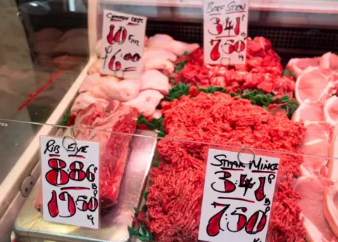 Daniel Harvey Gonzalez via Getty Image A meat counter