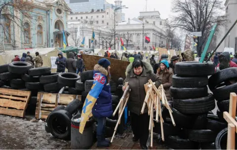 EPA Supporters of the former Georgian president and ex-Odessa Governor Mikheil Saakashvili setup a barricade in their tent camp near of Parliament building in Kiev