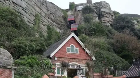 The East Cliff funicular railway viewed from the bottom of the cliffs on Hastings seafront.