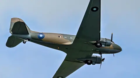 A Dakota is pictured in the sky above Shropshire