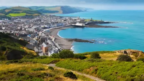 Getty Images A view over the beach and buildings of Aberystwyth