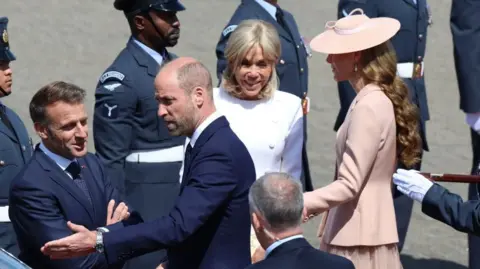 French President Emmanuel Macron (left) and his wife Brigitte (centre right) are welcomed by the Prince (centre left) and Princess of Wales (rigth) at RAF Northolt, London. Photo: 8 July 2025