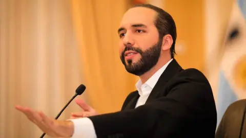 Handout via Reuters Salvadoran President Nayib Bukele during a meeting in San Salvador on 11 February 2021.