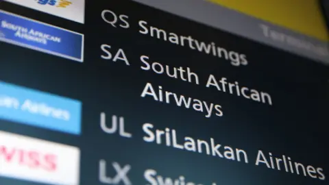 Getty Images South African Airways listed on a sign at Heathrow Terminal 5