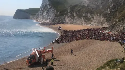 Dorset Police Helicopter landing on the beach