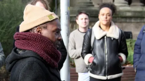 Julz Davis A man talking at an event