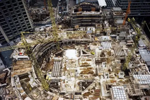 Historic England/John Laing Collection Aerial view of Barbican construction site