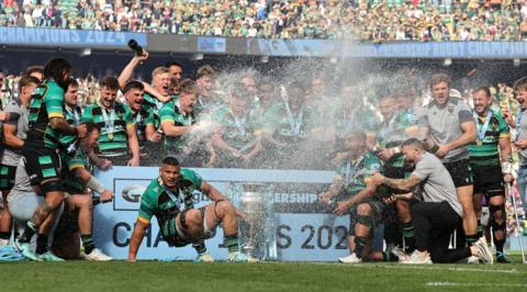 Northampton Saints celebrate with the trophy after winning the Gallagher Premiership final