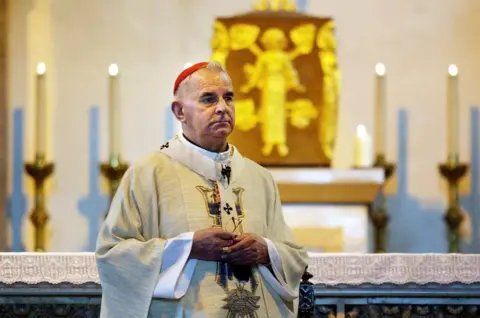 Cardinal Keith O'Brien in church celebrating Mass