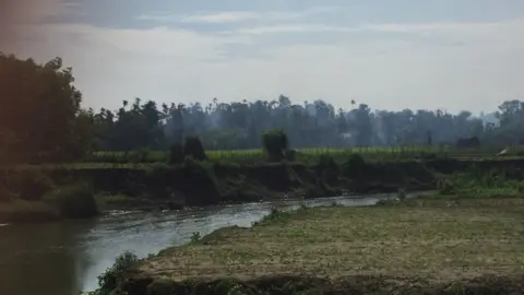 JHEAD/BBC Smoke rises from Gawdu Zara village in Rakhine state, Myanmar, on 7 September 2017