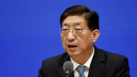 Reuters Zeng Yixin, vice minister of China"s National Health Commission, attends a news conference on the origin-tracing of the coronavirus disease