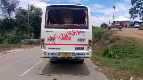 Dally Ezrela  Assam bus